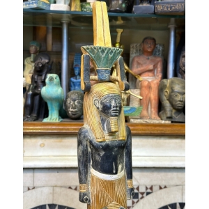 Pretty statue of Nefertem-God of healing-beauty-perfumes during the ancient Egypt-antiques-deities-Egyptian mythology-sculpture.