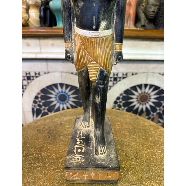 Pretty statue of Nefertem-God of healing-beauty-perfumes during the ancient Egypt-antiques-deities-Egyptian mythology-sculpture.