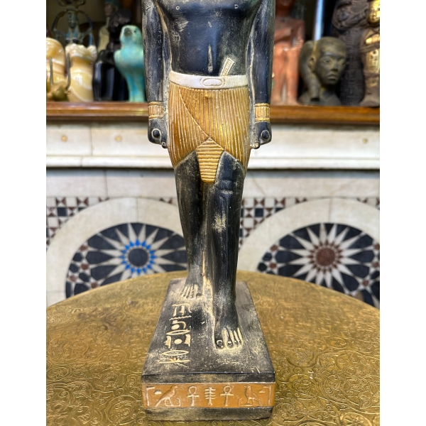 Pretty statue of Nefertem-God of healing-beauty-perfumes during the ancient Egypt-antiques-deities-Egyptian mythology-sculpture.